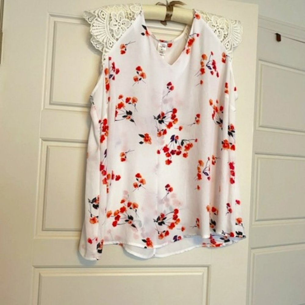 White blouse with lace shoulders